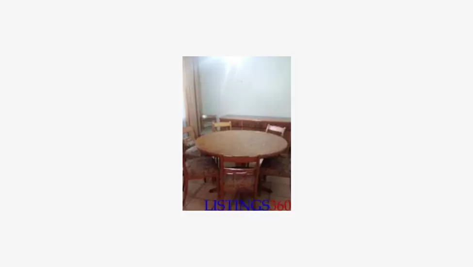 R5,000 8 seater Yew wood dining set